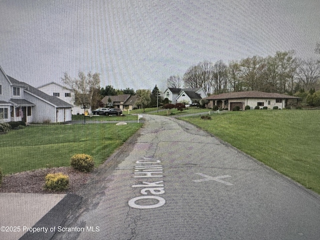 view of road featuring a residential view