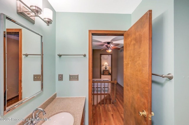 607 Pamela Dr, South Abington Twp, PA 18411 - bathroom featuring wood finished floors, vanity, and ceiling fan