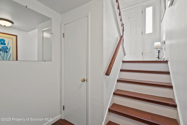 staircase with baseboards