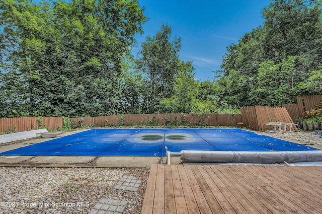 1300 Dundaff St, Dickson City, PA 18519 - view of pool featuring a fenced backyard, a diving board, and a wooden deck