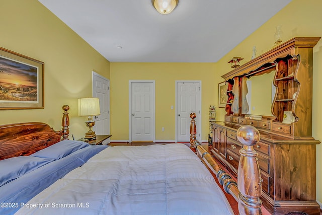 129 Wyndham Rd, South Abington Twp, PA 18411 - bedroom with baseboards and wood finished floors