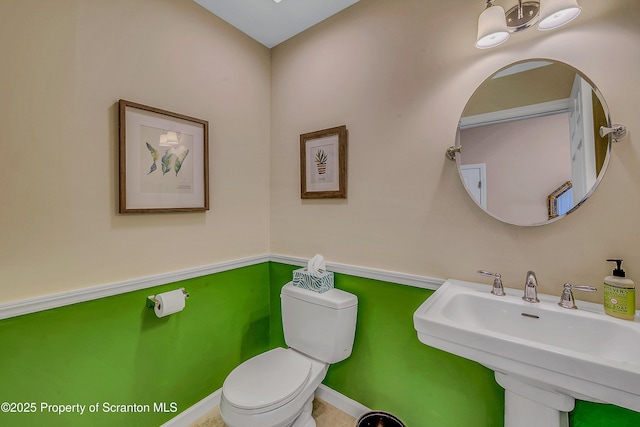 129 Wyndham Rd, South Abington Twp, PA 18411 - half bathroom featuring a sink and toilet