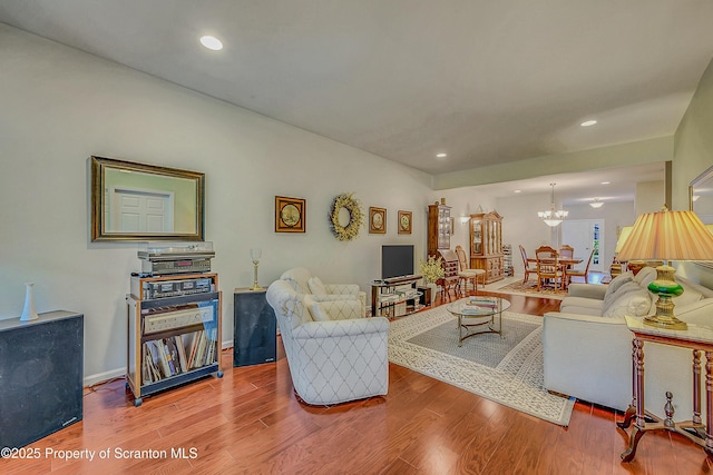 129 Wyndham Rd, South Abington Twp, PA 18411 - living area with recessed lighting, a chandelier, and wood finished floors