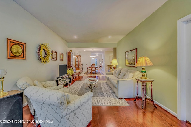 129 Wyndham Rd, South Abington Twp, PA 18411 - living area featuring a chandelier, wood finished floors, and recessed lighting