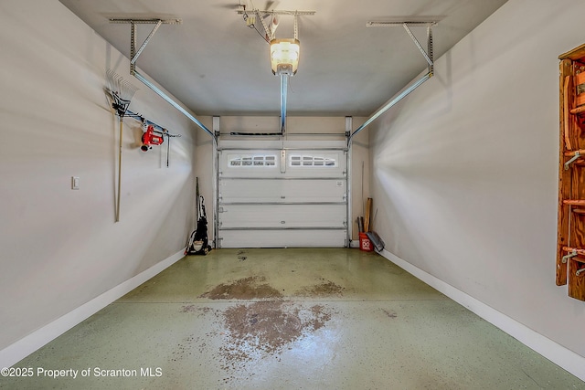 129 Wyndham Rd, South Abington Twp, PA 18411 - garage featuring a garage door opener