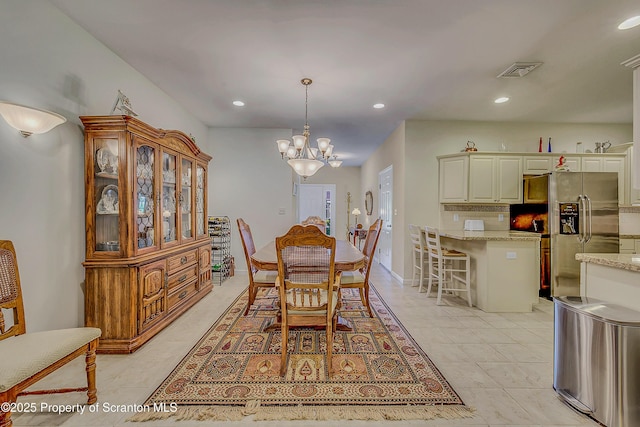 129 Wyndham Rd, South Abington Twp, PA 18411 - dining space featuring a chandelier, recessed lighting, and light tile patterned floors