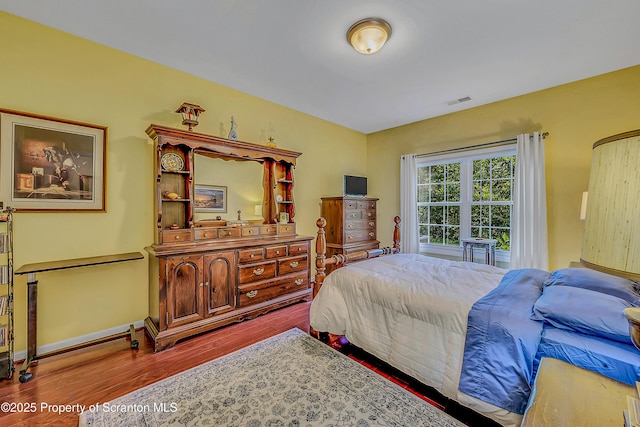 129 Wyndham Rd, South Abington Twp, PA 18411 - bedroom with wood finished floors and baseboards