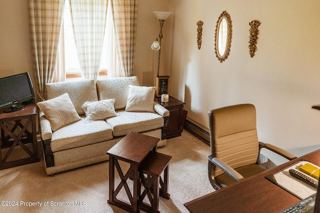 living area featuring baseboard heating and light carpet