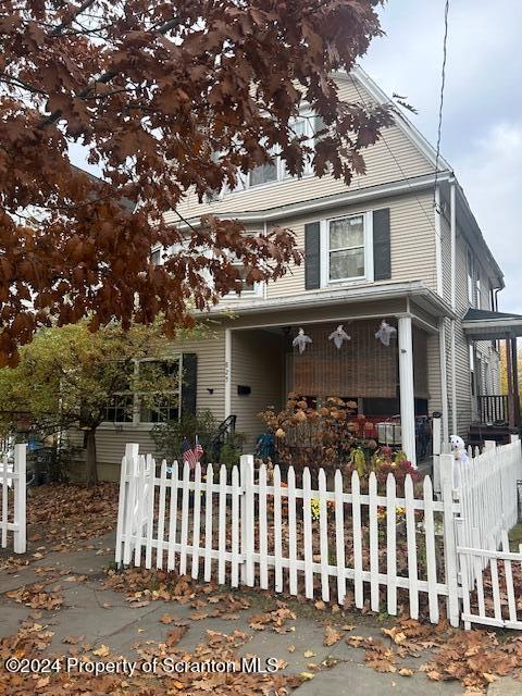 825 Prescott Ave, Scranton, PA 18510 - view of front of house with a fenced front yard and a porch