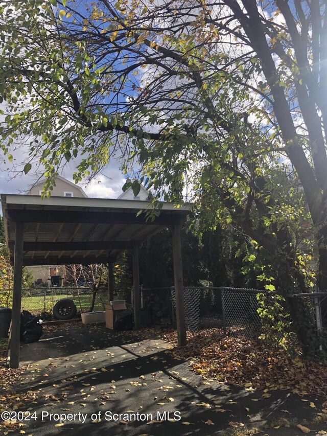 view of yard featuring a carport