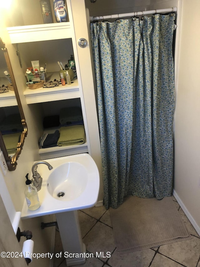825 Prescott Ave, Scranton, PA 18510 - bathroom featuring tile patterned floors and curtained shower