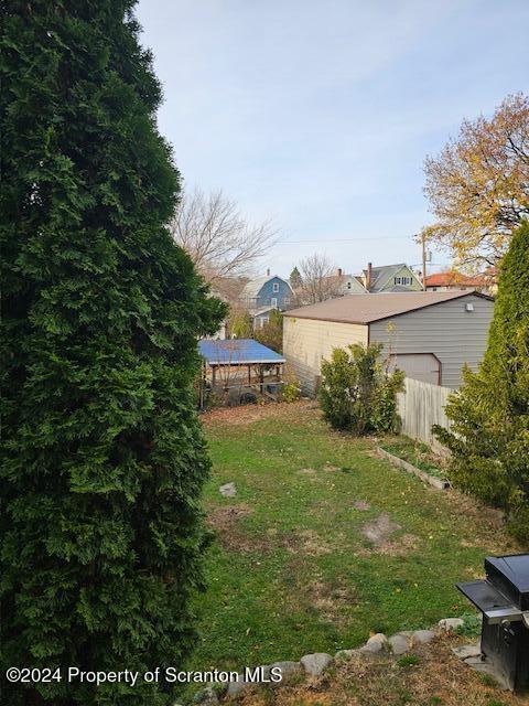 view of yard featuring a trampoline