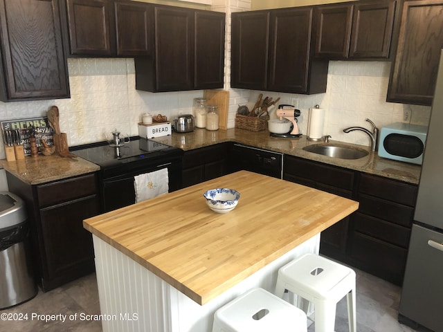 825 Prescott Ave, Scranton, PA 18510 - kitchen featuring black appliances, wood counters, backsplash, and dark brown cabinetry
