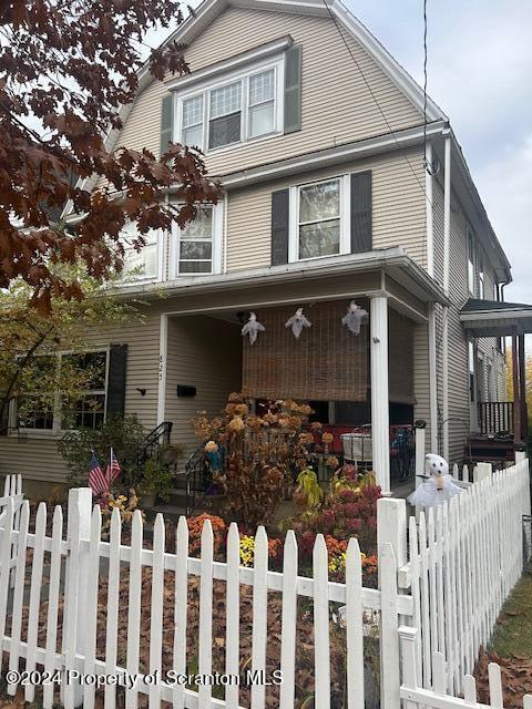 825 Prescott Ave, Scranton, PA 18510 - view of front of property with a porch and a fenced front yard