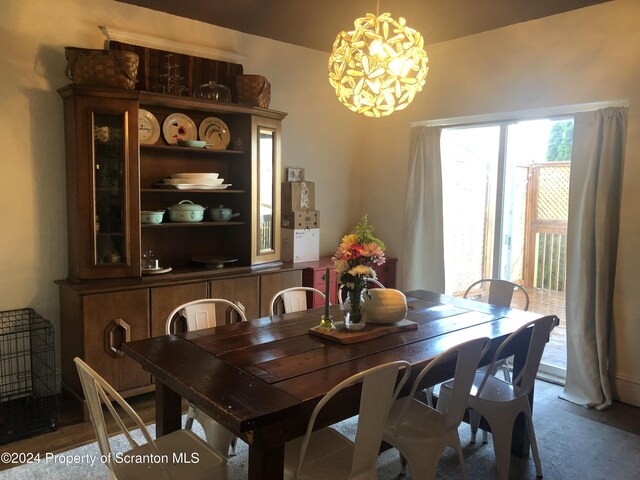 dining room featuring a chandelier