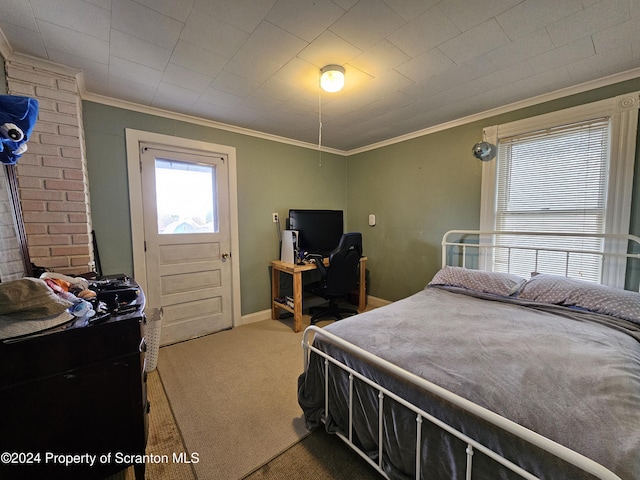 carpeted bedroom with crown molding