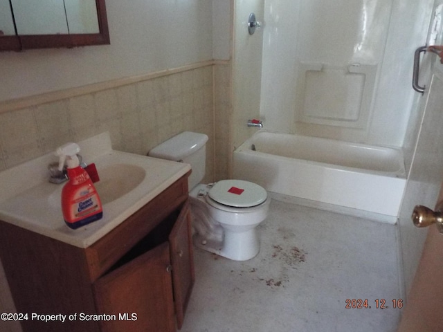 75 Hamlin Hwy, Moscow, PA 18444 - full bath with wainscoting, toilet, vanity, and shower / bathing tub combination