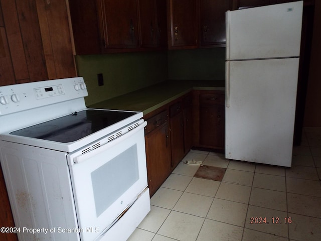 75 Hamlin Hwy, Moscow, PA 18444 - kitchen with light tile patterned floors and white appliances
