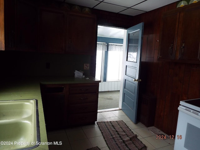 75 Hamlin Hwy, Moscow, PA 18444 - kitchen featuring white electric range, a sink, and light tile patterned flooring