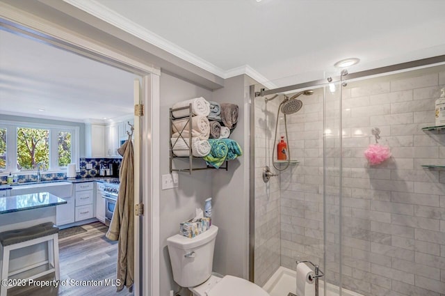 266 Warren Park Rd, New Milford, PA 18834 - full bath with crown molding, a shower stall, a sink, wood finished floors, and toilet