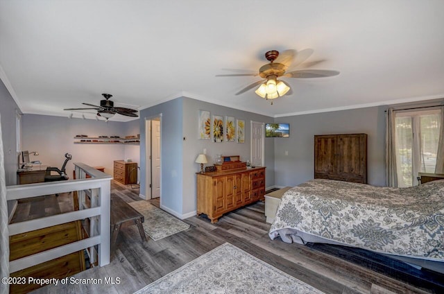 266 Warren Park Rd, New Milford, PA 18834 - bedroom featuring wood finished floors, crown molding, baseboards, and a ceiling fan