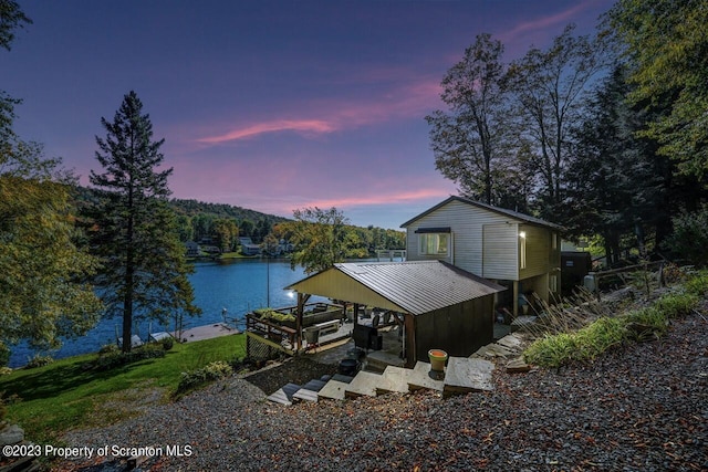 266 Warren Park Rd, New Milford, PA 18834 - rear view of house featuring a water view, boat lift, and metal roof