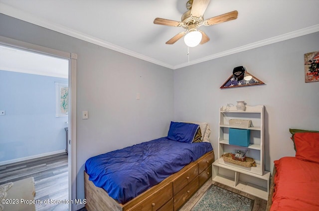 266 Warren Park Rd, New Milford, PA 18834 - bedroom with wood finished floors, crown molding, baseboards, and ceiling fan
