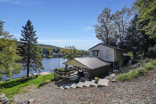 266 Warren Park Rd, New Milford, PA 18834 - view of side of property featuring a boat dock, boat lift, and a water view