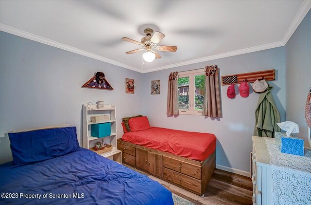 266 Warren Park Rd, New Milford, PA 18834 - bedroom with crown molding, wood finished floors, baseboards, and ceiling fan