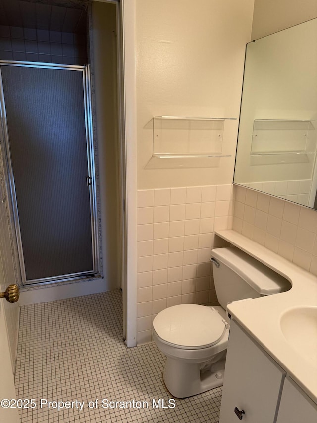 550 Clay Ave Unit 8C, Scranton, PA 18510 - bathroom with a shower stall, vanity, tile patterned flooring, and tile walls