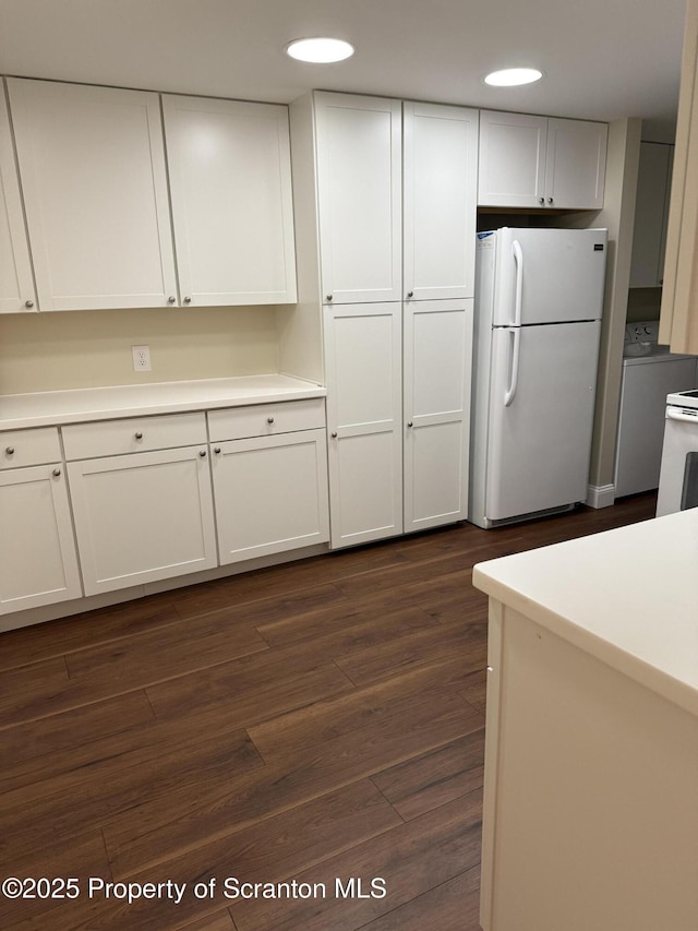 550 Clay Ave Unit 8C, Scranton, PA 18510 - kitchen featuring freestanding refrigerator, white cabinets, light countertops, dark wood-style flooring, and recessed lighting