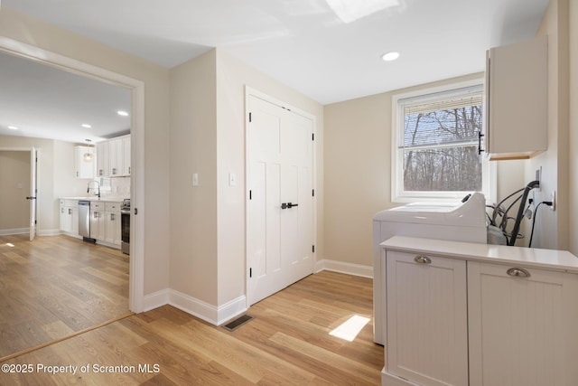 828 Lake Henry Rd, Lake Ariel, PA 18436 - laundry area featuring hookup for a washing machine, light wood-style floors, recessed lighting, baseboards, and visible vents