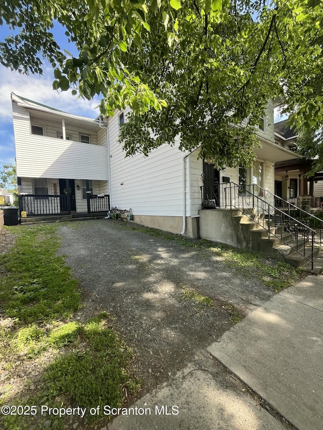 717719 Cedar Ave, Scranton, PA 18505 - rear view of house with a porch