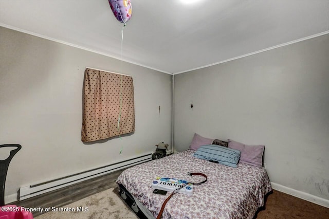 bedroom with baseboards, crown molding, and baseboard heating