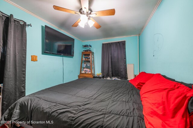 424 Hudson St, Forest City, PA 18421 - bedroom with crown molding and a ceiling fan