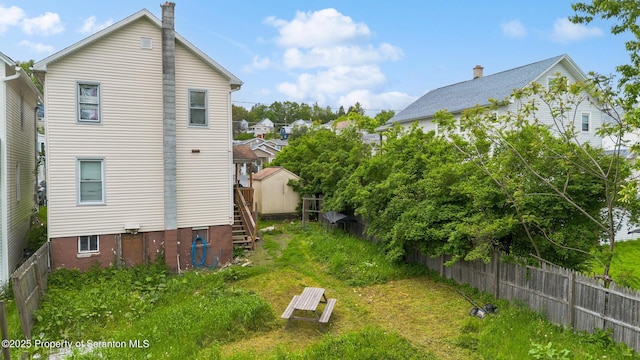 424 Hudson St, Forest City, PA 18421 - rear view of house with a chimney