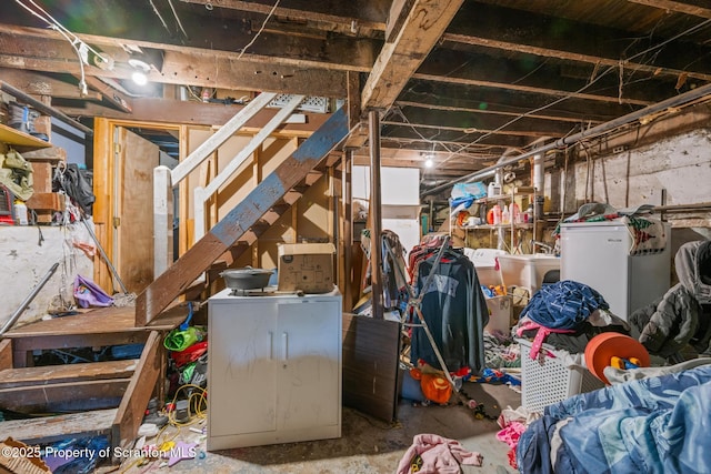 424 Hudson St, Forest City, PA 18421 - unfinished below grade area featuring stairway and separate washer and dryer