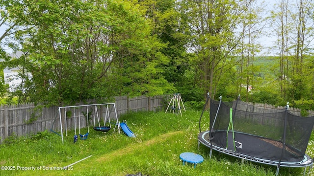 424 Hudson St, Forest City, PA 18421 - view of yard featuring a trampoline and a playground