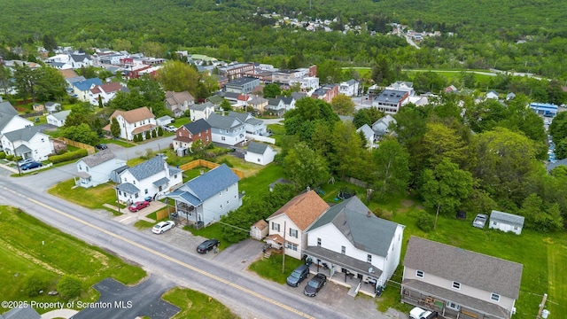 424 Hudson St, Forest City, PA 18421 - aerial perspective of suburban area with a heavily wooded area