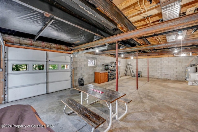 basement featuring water heater