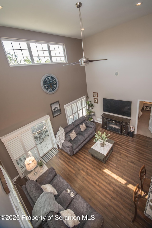 224 Shadow Wood Cir, Archbald, PA 18403 - living room with recessed lighting, a ceiling fan, wood finished floors, and a towering ceiling