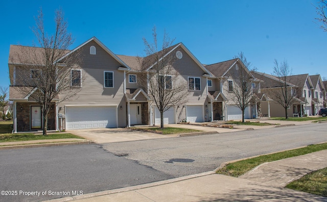 224 Shadow Wood Cir, Archbald, PA 18403 - townhome / multi-family property with a garage, a residential view, and driveway