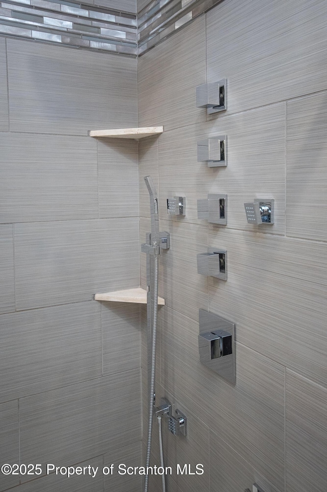 224 Shadow Wood Cir, Archbald, PA 18403 - bathroom with tiled shower and an AC wall unit