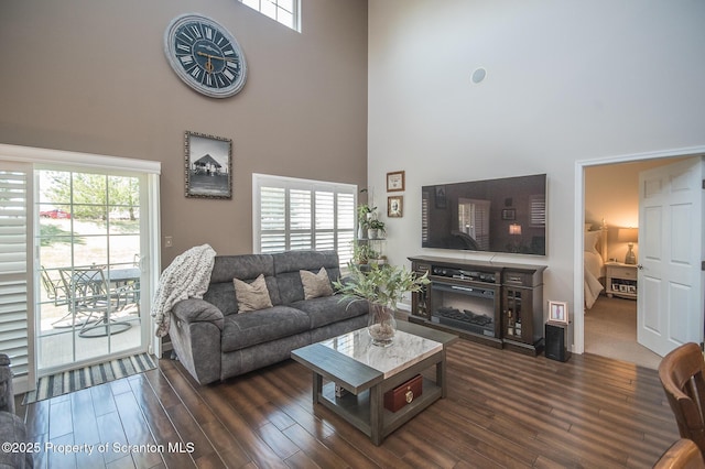 224 Shadow Wood Cir, Archbald, PA 18403 - living room featuring a towering ceiling and dark wood-style floors