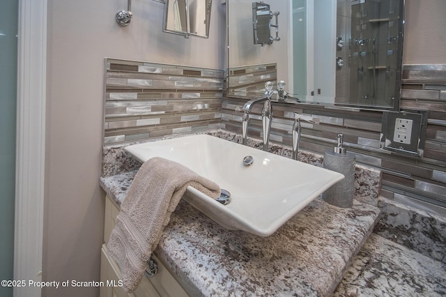 224 Shadow Wood Cir, Archbald, PA 18403 - bathroom featuring tasteful backsplash and a sink