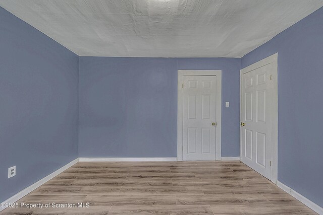 336 Grand Ave, Clarks Summit, PA 18411 - unfurnished room featuring baseboards and wood finished floors