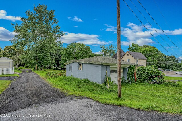 336 Grand Ave, Clarks Summit, PA 18411 - view of home's exterior with roof with shingles