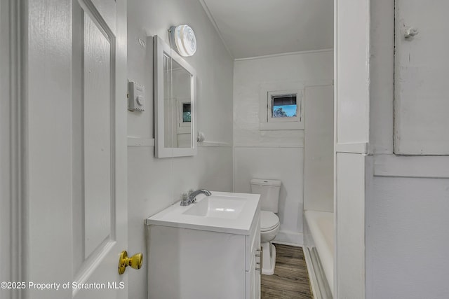 336 Grand Ave, Clarks Summit, PA 18411 - full bathroom featuring vanity, a tub to relax in, and wood finished floors