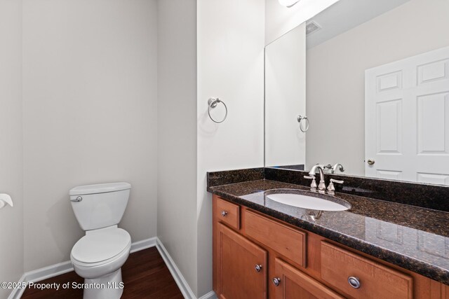 2103 Robinson Close, Moosic, PA 18507 - half bath featuring vanity and wood finished floors