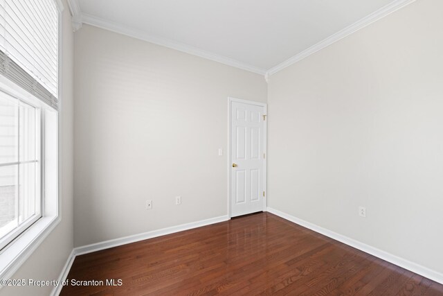 2103 Robinson Close, Moosic, PA 18507 - spare room featuring crown molding and dark wood-type flooring